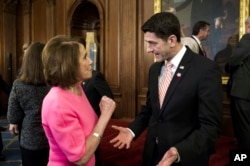 House Speaker Paul Ryan, R-Wis., talks with House Minority Leader Nancy Pelosi, D-Calif., on Capitol Hill in Washington, Dec. 8, 2016. A day ahead of a government shutdown deadline, Congress scrambled to wrap-up unfinished business.