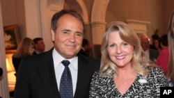 FILE - In this May 5, 2011 file photo provided by the office of the Governor of Virginia, Jonnie Williams left, and Maureen McDonnell, wife of then Gov. Bob McDonnell, pose for a photo.