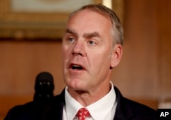 FILE - Interior Secretary Ryan Zinke speaks at the Interior Department in Washington, April 26, 2017.