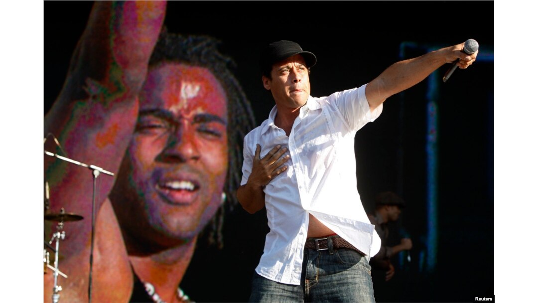 Ruzzo and Yotuel (L) of the Cuban hip-hop Orishas band perform at the Rock in Rio music festival in Lisbon, June 6, 2008.