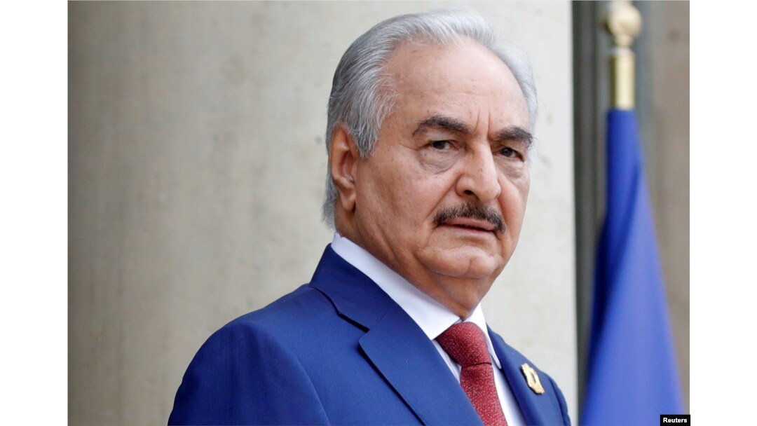 FILE PHOTO: Khalifa Haftar, the military commander who dominates eastern Libya, arrives to attend an international conference on Libya in Paris, May 29, 2018.