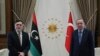 Turkey's President Recep Tayyip Erdogan, right, and Fayez Sarraj, the head of Libya's internationally-recognized government, speak prior to their talks in Ankara, Turkey, June 4, 2020. 