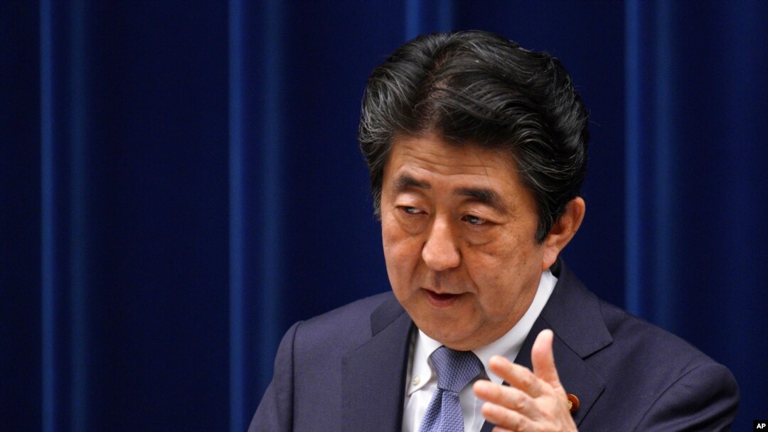 Japan's Prime Minister Shinzo Abe answers a question from a journalist during a press conference at the prime minister's official residence in Tokyo, July 20, 2018. 