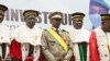 New interim Malian President, Colonel Assimi Goita, center, stands with members of the Supreme Court during his swearing in ceremony in Bamako on June 7, 2021.