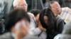 Relatives of passengers on a plane that burst into flames mourn at Muan International Airport in Muan, South Korea, Dec. 30, 2024.