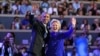 President Barack Obama and Democratic Presidential candidate Hillary Clinton wave together during the third day of the Democratic National Convention in Philadelphia , July 27, 2016. 