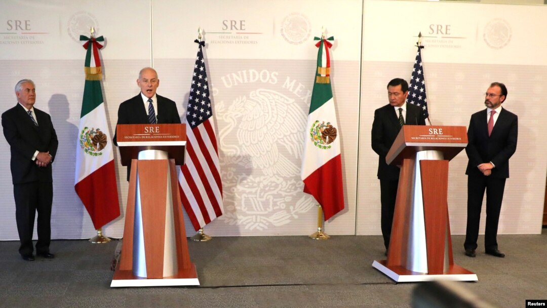 Secretary of Homeland Security John Kelly delivers a statement accompanied by U.S. Secretary of State Rex Tillerson (left), Mexico's Foreign Secretary Luis Videgaray (right), and Secretary of Government Angel Osorio (second from right) at the Ministry of Foreign Affairs in Mexico City, Feb. 23, 2017.