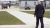 Secretary of State John Kerry walks from his plane after arriving in Chicago, April 15, 2013, to visit the parents Anne Smedinghoff, the young U.S. diplomat killed in Afghanistan while delivering textbooks.