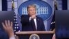 President Donald Trump points to a reporter for a question during a news briefing at the White House in Washington, July 21, 2020.