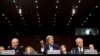 General Martin E. Dempsey (L), John Kerry, U.S. Secretary of State (C), and Chuck Hagel, Secretary of Defense, present the administration's case for U.S. military action against Syria to a Senate Foreign Relations Committee, Sept. 3, 2013.