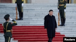 FILE - Chinese President Xi Jinping arrives for a ceremony at the Great Hall of the People, in Beijing, China, Oct. 25, 2019.
