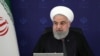 FILE - Iranian President Hassan Rouhani speaks during a meeting in Tehran, as the spread of coronavirus disease (COVID-19) continues, April 5, 2020.