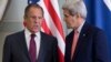 U.S. Secretary of State John Kerry talks with Russian Foreign Minister Sergey Lavrov, left, at the U.S. Chief of Mission Residence in Paris, France, Oct. 14, 2014. 