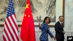 美国总统国家安全事务助理苏珊·赖斯与中国国务委员杨洁篪 (2014年9月8日)