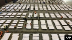 中國武漢將一個會展中心改建成收治新冠病毒感染患者的醫院。（2020年2月4日） 