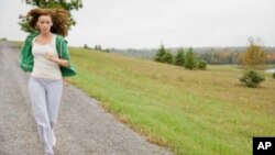 FILE - New research shows that fitness level increases the chances of surviving a first heart attack.