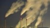 FILE - Smoke streams from the chimneys of the E.ON coal-fired power station in Gelsenkirchen, Germany, Nov. 24, 2014.
