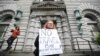 FILE - Beth Kohn protests against U.S. President Donald Trump's executive order outside the 9th U.S. Circuit Court of Appeals courthouse in San Francisco, California, Feb. 7, 2017.