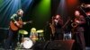 Iron & Wine's Sam Beam performs with his new band at the SXSW Music Festival in Austin, Texas, March 13, 2013.