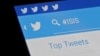 FILE - The Islamic State hashtag (#ISIS) is seen typed into the Twitter application on a smartphone in this picture illustration taken in Zenica, Bosnia and Herzegovina.