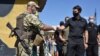 Civilian Casualties Drop in Eastern Ukraine as Cease-fire Holds