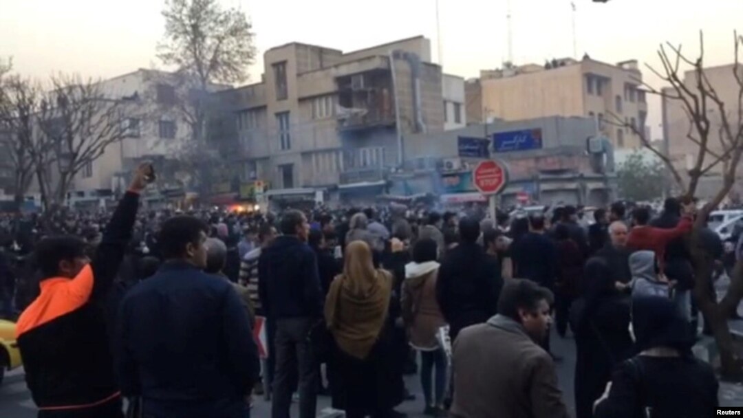 People protest in Tehran, Iran, Dec. 30, 2017, in this still image from a video obtained by Reuters.
