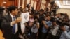 National Election Committee officer shows the logo of the ruling Cambodian People's Party (CPP) during a drawing lots to determine the order of political party on ballot papers for July election, in Phnom Penh, Cambodia, May 29, 2018. 