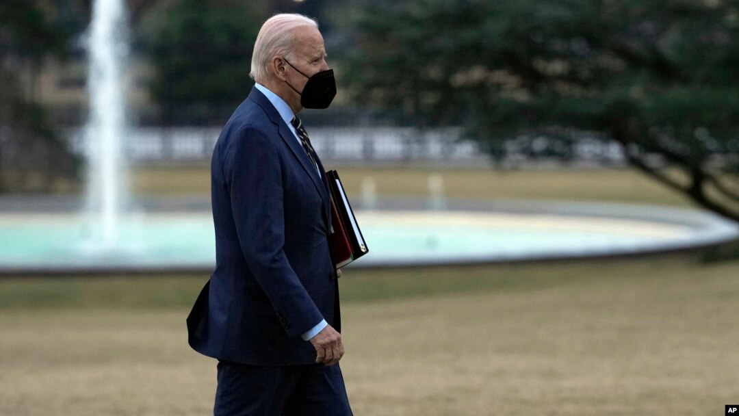 President Joe Biden walks from Marine One towards the Oval Office on the South Lawn of the White House in Washington, Jan. 11, 2023. 