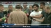 In the screen shot from www.1tv.ru, Captain Konstantin Murakhtin, the surviving airman of the downed Russian fighter jet, speaks to Russian TV journalists.