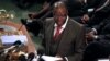 Zimbabwe's Finance Minister Tendai Biti delivers his speech about the 2013 budget at the Parliament in Harare, Zimbabwe, November 15, 2012.