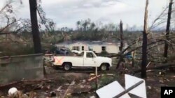 This photo shows debris in Lee County, Ala., after what appeared to be a tornado struck in the area Sunday, March 3, 2019. 