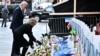 U.S. President Joe Biden and First Lady Jill Biden lay flowers as they pay their respects to victims of the Jan. 1 truck attack at a makeshift memorial in Bourbon Street in New Orleans, Louisiana, on Jan. 6, 2025.