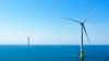FILE - Two of the offshore wind turbines have been constructed off the coast of Virginia Beach, Va., June 29, 2020. 