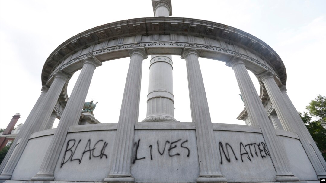 The words “Black Lives Matter” spray painted on a monument to former Confederate President Jefferson Davis in Richmond, Va., June 25, 2015.