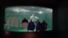 ปลาพระอาทิตย์ในตู้ปลาที่ตกแต่งด้วยคัทเอาท์และเสื้อผ้า ที่ Shimonoseki Marine Science Museum (Reuters)