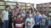Some members of the secret library team gather in their underrground sanctuary in Daraya, Syria. (Photo courtesy of Ahmad Ma'dmani)