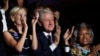 Former President Bill Clinton applauds Former Democratic Presidential candidate, Sen. Bernie Sanders, I-Vt., as he speaks during the first day of the Democratic National Convention in Philadelphia , Monday, July 25, 2016.