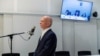 FILE - Former Venezuelan intelligence chief Hugo Carvajal stands during his extradition hearing to the U.S. at the High Court in Madrid, Spain, Sept. 12, 2019. 