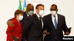 Presidente francês, Emmanuel Macron, directora do FMI, Kristalina Georgieva, Presidente senegalês Senegalês, Macky Sall e Presidente da RDC, Felix Tshisekedi, em Paris, 18 de Maio de 2021