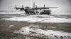 A Belgian C-130 aircraft, on stand by to leave for Mali, is parked at Belgium's Melsbroek military airport on January 15, 2013. 