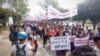 ကချင်စစ်ရပ်စဲရေးဆန္ဒပြနေစဉ် (Hkun Awng Nlam)