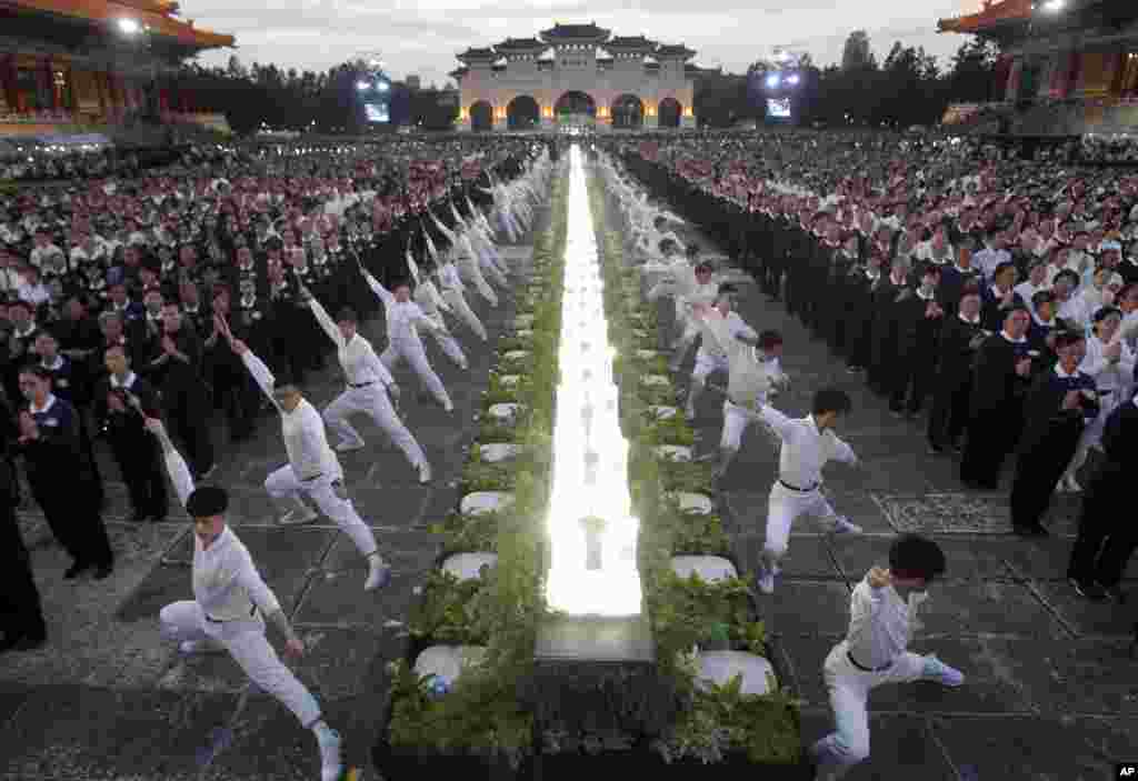 Taiwanese people perform during the Buddha's Birthday celebration in front of the Chiang Kai-shek Memorial Hall in Taipei.