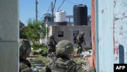 以色列軍方公佈的照片顯示其軍人2024年5月8日正在拉法採取「規模有限」的軍事行動。