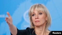 FILE - Russia's Foreign Ministry spokeswoman Maria Zakharova reacts during the annual news conference of the Russia's Foreign Minister Sergei Lavrov (not pictured) in Moscow, Jan. 16, 2019. 