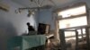 FILE - A medic inspects the damage inside Anadan Hospital, sponsored by Union of Medical Care and Relief Organizations, after it was hit by an airstrike in the rebel-held city of Anadan, northern Aleppo province, Syria, July 31, 2016.