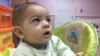 FILE - This child lived in a Mosul orphanage where offspring of Islamic State fighters and their victims lived, Dec. 24, 2017. Neither the children nor their caretakers are told the youths' individual origins,