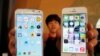 FILE - Smartphones