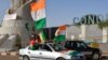 Apoiantes da Aliança dos Estados do Sahel (AES) celebram a saída do Mali, do Burkina Faso e do Níger da Comunidade Económica dos Estados da África Ocidental (CEDEAO), em Niamey, a 28 de janeiro de 2024. 