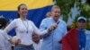 ARCHIVO - María Corina Machado y Edmundo González Urrutia, dirigentes de la oposición venezolana, participan en un mitin de campaña en Guatire, el 31 de mayo de 2024.