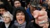 A woman shouts during a rally to support political prisoners in Moscow, Russia, Sunday, Sept. 29, 2019.